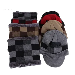 Detail of winter knit hat and neck gaiter set with warm thick gray fleece lining
