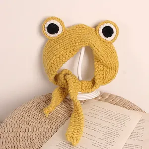 Handmade yellow frog knitted baby hat with big eyes and adjustable earflaps straps