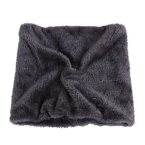Detailed view of soft dark grey faux fur neck warmer with thick plush lining for winter