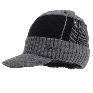 Black and grey knitted brimmed beanie with fleece lining and metal Sport detail