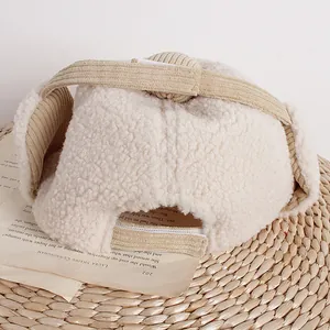 Kinder Wintermütze aus Teddyfleece mit Cordbesatz und verstellbarem Klettverschluss