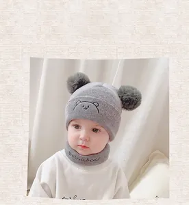 Gray baby winter knit hat and scarf set with cute bear embroidery and pom-poms