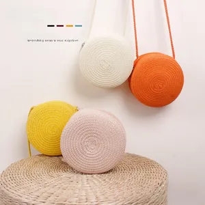 Détails de petits sacs bandoulière ronds en paille tissée pour enfants en quatre coloris