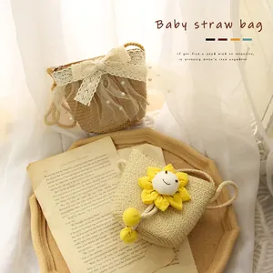 Cute summer girls straw crossbody bag with lace bow and floral decorations