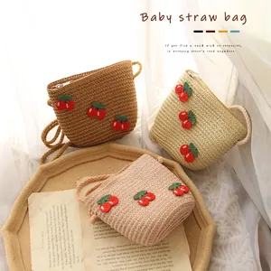 Kids woven straw crossbody bags with cherry embroidery in brown, beige and cream white