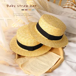 Kids vintage straw boater hat with black ribbon for beach sun protection and summer style