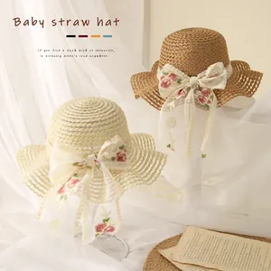 Chapeau de soleil en paille pour enfants avec nœud en dentelle et broderie florale