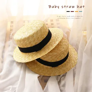 Classic kids straw sun hat with black ribbon, bohemian beach style for boys and girls