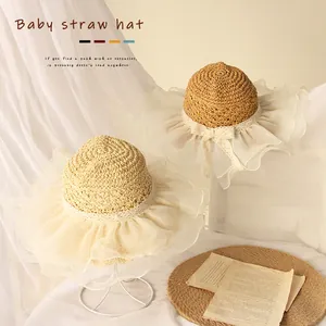 Baby straw hat with wide lace mesh brim and bow for summer sun protection