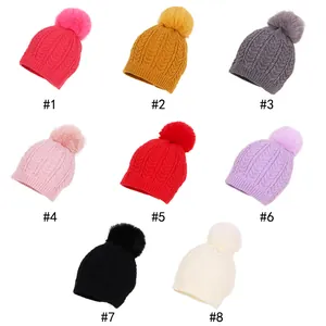 Bonnets d'hiver en tricot torsadé pour bébés en huit couleurs avec pompons moelleux