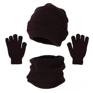 Close-up of wine red knitted winter set featuring warm fleece lining and touchscreen gloves