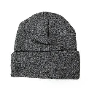 Detail of a thick melange grey winter beanie with a folded cuff for cold weather