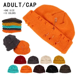Distressed knit beanie with metal rings and safety pin accessory in ten colors