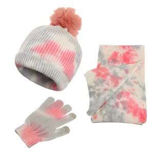 Kids winter set with tie-dye knit hat, scarf and gloves in grey and coral pink