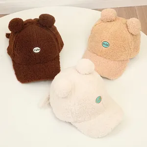 Cute baby winter baseball caps with round ears in warm fleece, featuring cute letter patches
