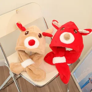 Detail of plush baby reindeer hats in red and khaki with cute 3D antlers and soft texture
