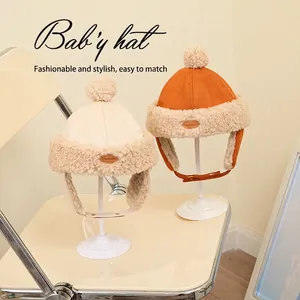 Children's warm lamb wool aviator hat with plush pom-pom and adjustable chin strap