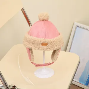 Pink suede and white faux shearling winter trapper hat for kids with earflaps