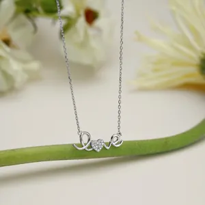 Macro view of S925 silver Love pendant necklace with sparkling cubic zirconia heart