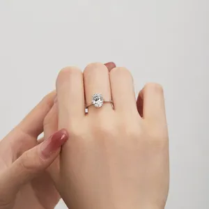 Detailed view of an oval-cut zircon stone set in an S925 sterling silver ring on a finger