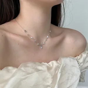Elegant 925 sterling silver four-leaf clover necklace with sparkling cubic zirconia