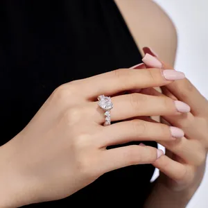 Macro detail of silver heart ring with large heart-shaped gemstone and side micro-pave