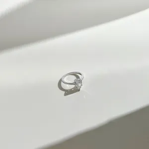 Macro detail of S925 sterling silver ring with water drop pear cut cubic zirconia