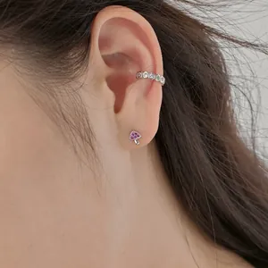 Detail of S925 sterling silver ear cuff and purple mushroom stud with zircon stones