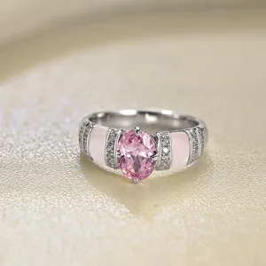S925 sterling silver ring with pink shell center stone and sparkling cubic zirconia pavé