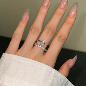 Elegant S925 sterling silver snake-shaped wrap ring with pear-cut zircon on model hand