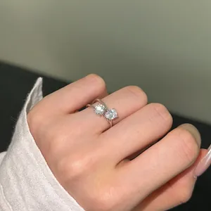Elegant S925 sterling silver ring featuring a double pear-shaped zircon stone design