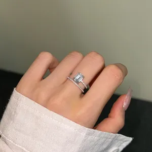 S925 sterling silver layered ring featuring emerald-cut zircon and pavé-set accents