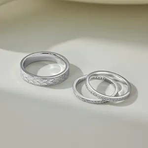 Detailed view of S925 sterling silver rings with leaf patterns and zircon stones
