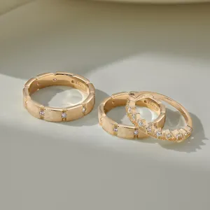 Three-piece gold plated S925 silver rings set with cubic zirconia and frosted finish
