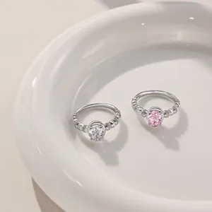 Macro shot of S925 sterling silver rings with pink and clear marquise cubic zirconia