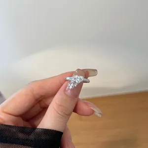 Close-up of S925 sterling silver ring featuring heart-cut marquise cubic zirconia detail