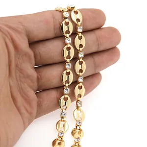 Detailed view of 18K gold plated coffee bean chain link with inlaid cubic zirconia