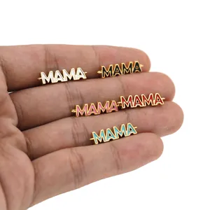 Detail of 18K gold plated MAMA connector charms with colorful enamel and zircon stones