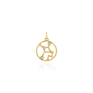Macro detail of 18K gold plated Sagittarius zodiac pendant with cubic zirconia inlay