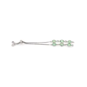 Detail of silver box chain bracelet with green gemstones and adjustable slide buckle