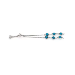 Adjustable silver bolo bracelet featuring six circular blue stones in a bezel setting