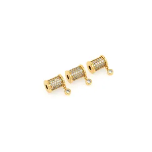 Perline cilindriche placcate oro 18K con micro zirconi e piccoli ciondoli diamantati