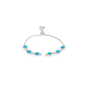 Detail view of 18K gold plated bracelet with six blue crystals and adjustable slider clasp