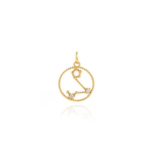 Macro view of 18K gold plated zodiac charm with sparkling cubic zirconia stones