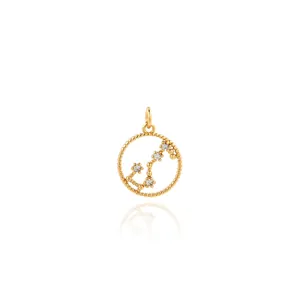 Macro shot of 18K gold plated zodiac pendant with micro-set cubic zirconia stones