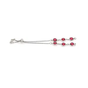 Detail of silver-tone adjustable slider bracelet with round-cut red crystals and beads