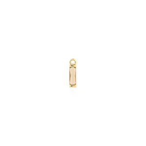 Detailed macro view of 18K gold-plated rectangle champagne zircon pendant with ring