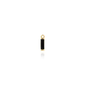 Detail of 18K gold-plated rectangular pendant with black gemstone and polished metal frame