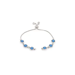 Detail of silver chain bracelet with six round blue gems and adjustable slider clasp