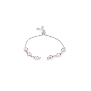 Detail of adjustable silver bracelet with six pink faceted gemstones in bezel settings